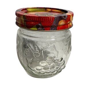 Small Glass Jar With Fruit Print Lid Embossed Fruit Design 3.5 Inches Tall  Jam